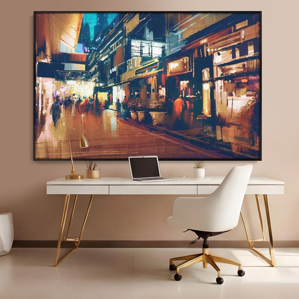 Tablou canvas cu pictura urbana cu strada luminata noaptea, in rama de aluminiu negru, pe perete intr-un birou